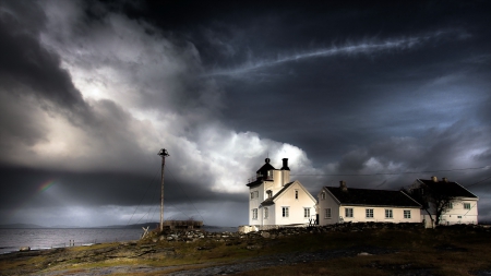 lighthouse under stormy skies - storm, clouds, coast, rainbow, lighthouse, sea