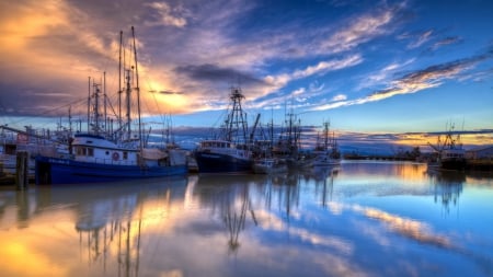 the fishing fleet docked in harbor - reflections, boats, clouds, harbor, docks