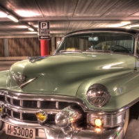 classic cadillac in an underground parking lot hdr