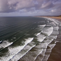 a view of vast sea waves coming on beach