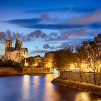 notre dame cathedral in paris at dusk