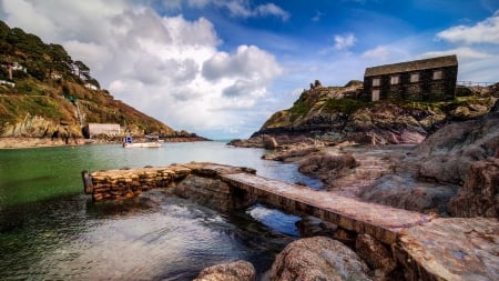 lovely pier and dock in the village of polperro england - village, clouds, river, dock, rocks, pier