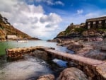 lovely pier and dock in the village of polperro england