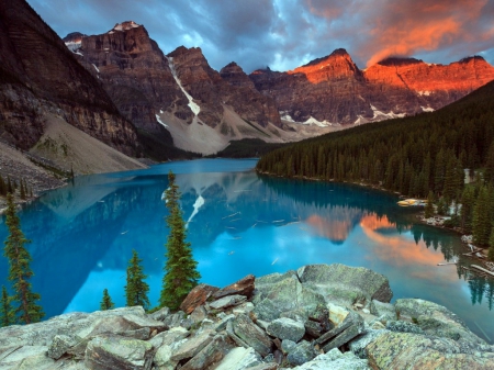 Moraine lake - nice, water, clear, rocks, crystal, reflection, moraine, lake, boats, mountain, shore, majestic, peak, lovely, nature, forest, blue, beautiful, canada, stones