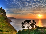 sunset over coast in exmoor england hdr