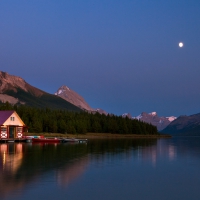 boathouse on maligne lake canada under moonlight