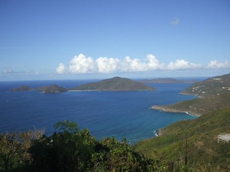 Blue Ocean - hill, sky, ocean, trees, water, mountains, clouds, island, sea