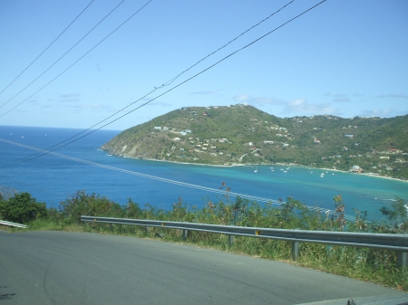 Ocean View - street, slope, beach, sky, trees, cliff, water, greenery, mountains, road, path, view, green, ocean, hills, bush, plants, guard rail, blue, scenery, sea