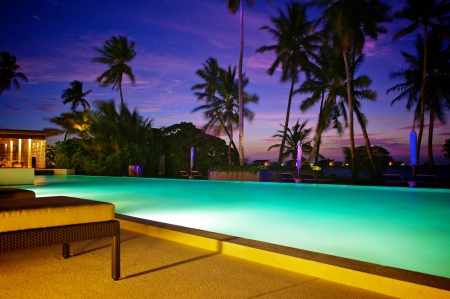 Pool Lights at Night - beach, paradise, sunset, escape, evening, lagoon, holiday, resort, dusk, ocean, swimming, light, islands, night, tropical, heaven, luxury, blue, island, spa, pool, sea, lights