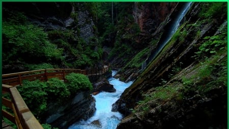 a trail along a canyon river - river, trail, bushes, cliffs, canyon