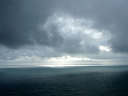 A Break in the Clouds - calm, sky, cloud, grey, sea