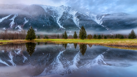 mt currie reflected in pemberton golf course canada - lake, trees, reflection, fog, mountains, golf course