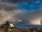 passing storm over lighthouse in ucluelet vancouver isl.