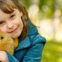 Girl and teddy bear