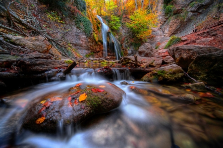 Small forest waterfall - calm, cascades, forest, leaves, nice, falling, trees, beautiful, small, lovely, stones, fall, colorful, nature, waterfall, season, serenity, foliage, rocks