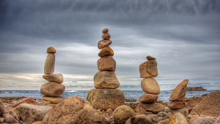 amazing rock stacks on a rocky shore - clouds, stacks, shore, sea, rocks