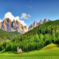 fantastic church at the foot of mighty mountains hdr