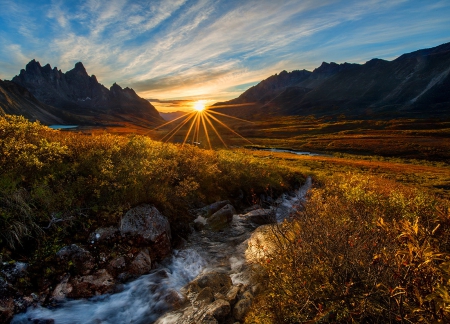 Mt Tombstone autumn glow - sky, dazzling, autumn, tombstone, sun, sunset, field, shine, creek, foliage, amazing, fall, river, clouds, grass, rays, mountain, hills, falling, light, mount, nature, glow, fiery, sunrise