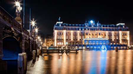 Hotel in Amsterdam - reflections, house, fountain, boat, evening, river, lights, bridge, netherlands