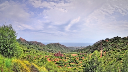 natural park desert les palmes in spain - valley, ruins, green, mountains, sea