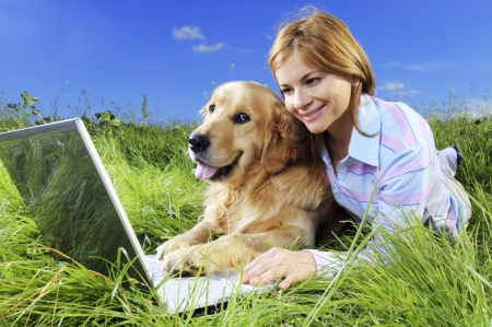 I have Facebook, too! - smile, nature, woman, grass, field, laptop, dog pet