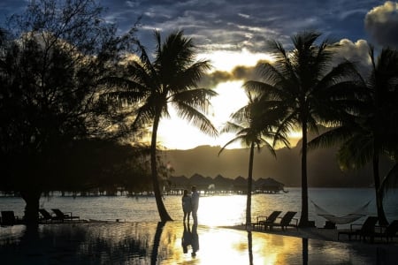 Bora Bora Sunset over Pool - bora bora, beach, islands, ocean, swimming, pool, view, tahiti, couple, sunset, evening, polynesia, romance, sun, set, south pacific, sand, lagoon, dusk, reflection, island, sea, romantic