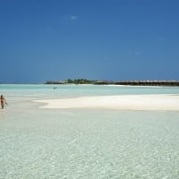 white sand beach and clear blue lagoon