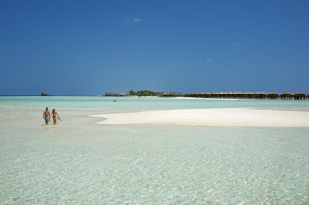 white sand beach and clear blue lagoon