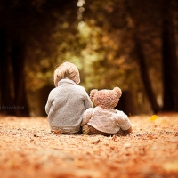 Boy and teddy bear