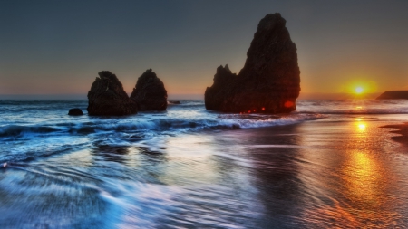 superb sunset over boulders on a beach - surf, sunset, rays, beach, boulders, sea