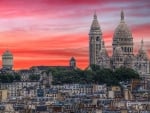 cathedral on a hill in paris at sunset