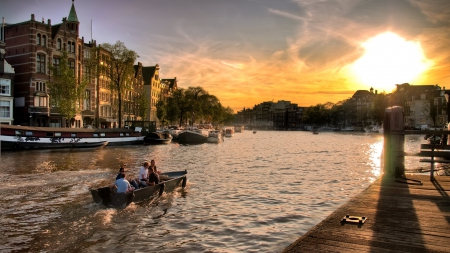 boat in main canal of amsterdam at sundown - city, canal, sundown, boat