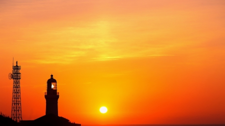 lighthouse and com antenna in glorious sunset - orange, lighthouse, sunset, antenna