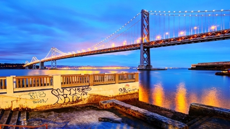 view of the frisco bay bridge in evening - lights, evening, graffiti, dock, bridge, bay