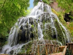 Foot Bridge beside Waterfall