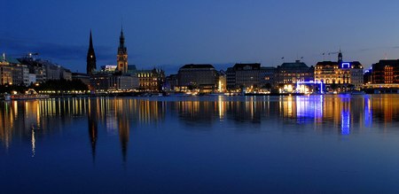 city by nightfall by water