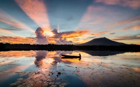 rowing on a lake at sunrise - rays, lilies, lake, reflection, sunrise, boat