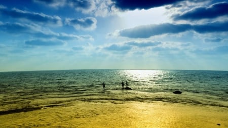 fishing on a sun swept seashore - sunshine, fishing, clouds, shore, sea