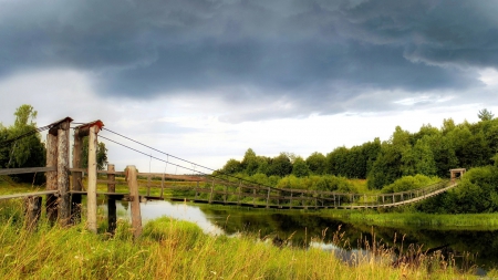 lovely pedestrian suspension bridge - suspension, trees, river, bridge, grass