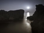 moonshine over coastal cliffs