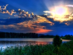 gorgeous sunset behind dark clouds