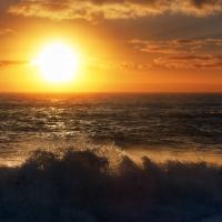 magnificent sunset over ocean waves