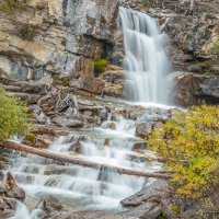 beautiful waterfall over rock steps