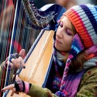 Girl playing harp