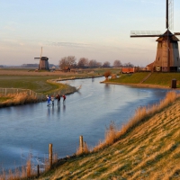 skating on a river in holland