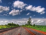 rusty rails under big sky hdr