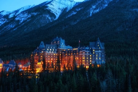 Banff National Park - snowy, lights, rocks, national park, cliffs, beautiful, rest, hotel, banff, castle, mountain, evening, canada, night, sky, dusk, peaks, building, lovely, alberta, trees