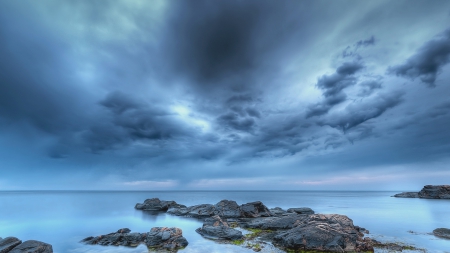 beautiful clouds over rocky seashore - clouds, shore, sea, blue grey, rocks