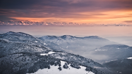 a superb mountain range in the distance - forests, range, winter, sunset, mountains