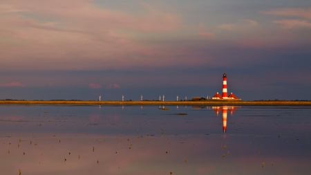 beautiful red and white lighthouse reflected - sea, reflecrions, windmills, lighthouse